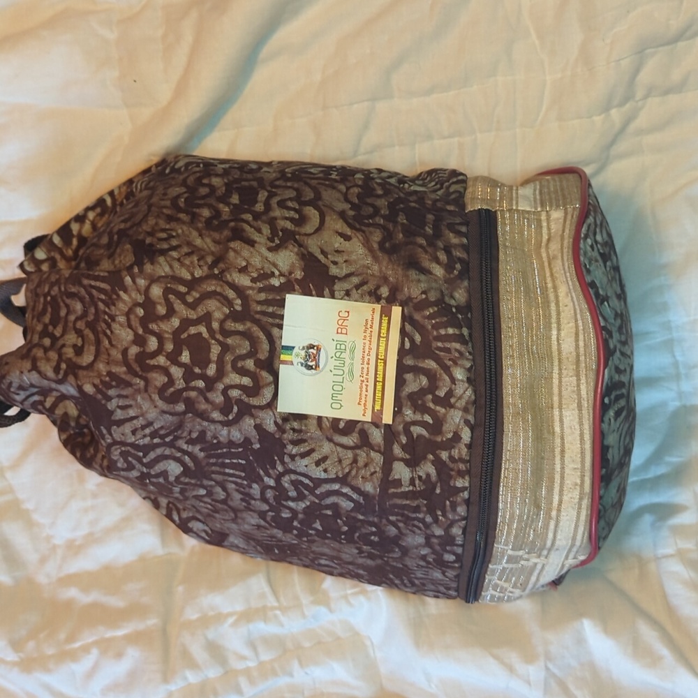 Unique Rare "Militating against climate change" OMOLUWABI BAG bucket bag